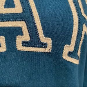 turquoise gap with white logo sweatshirt